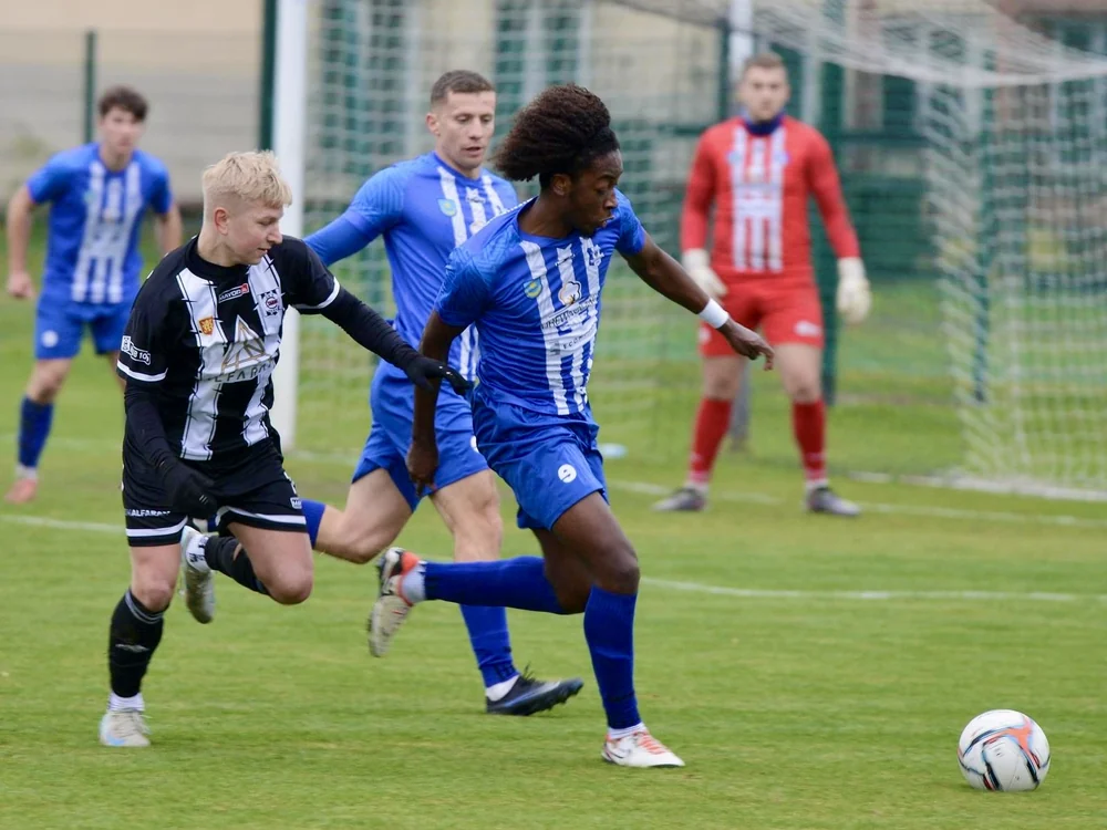 Foley Nkem playing football abroad